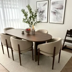 Simple Oval Walnut Dining Table with Beige Boucle Curved Chairs - Image 1