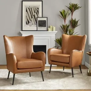Modern Cognac Leatherette Wingback Bedroom Chairs with Black Tapered Legs - Image 1