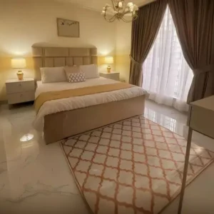 Elegant Deco Beige Upholstered Bed with Luxury Gold Lighting Accents - Image 1